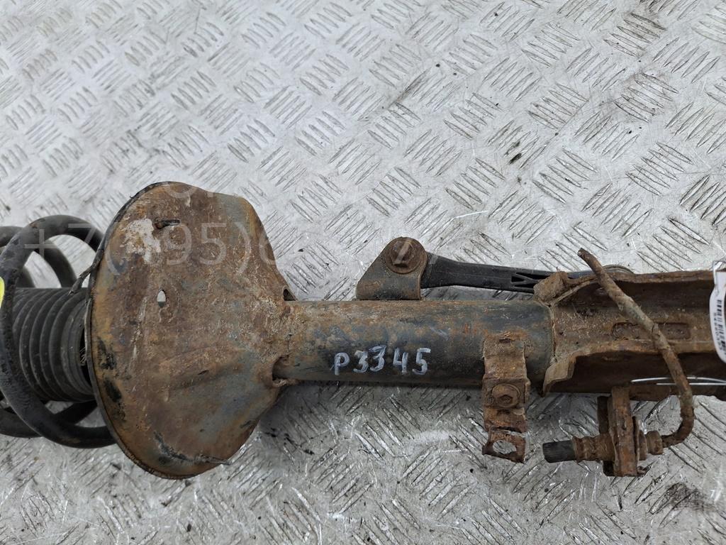 Амортизатор задний левый