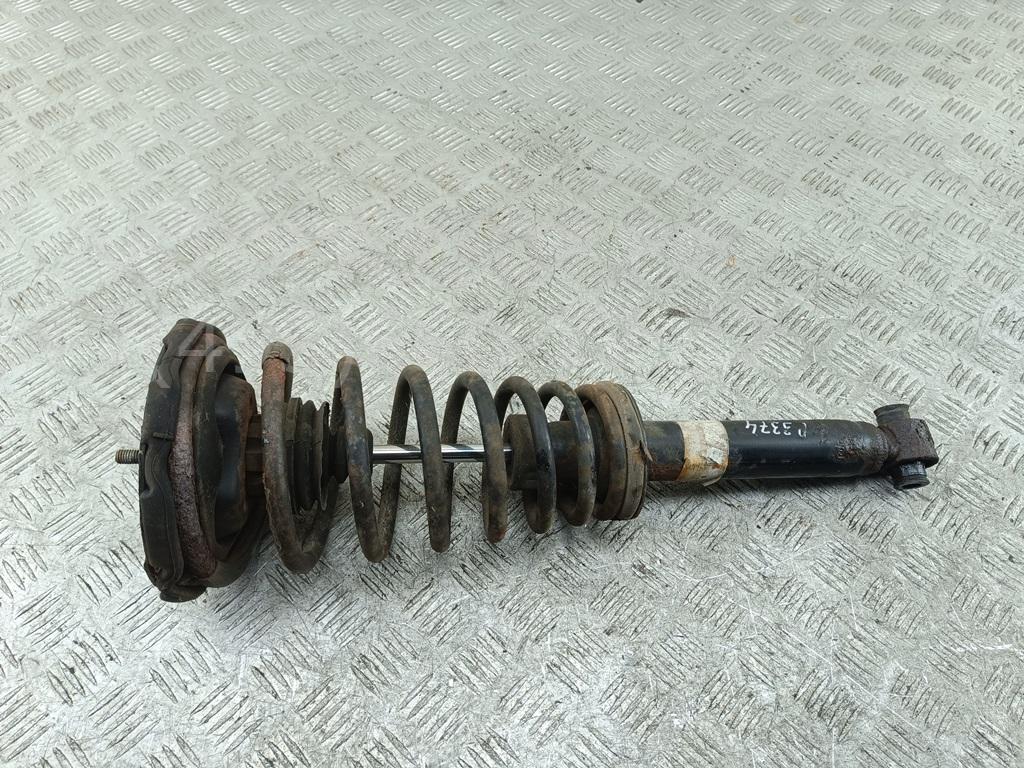 Амортизатор передний левый