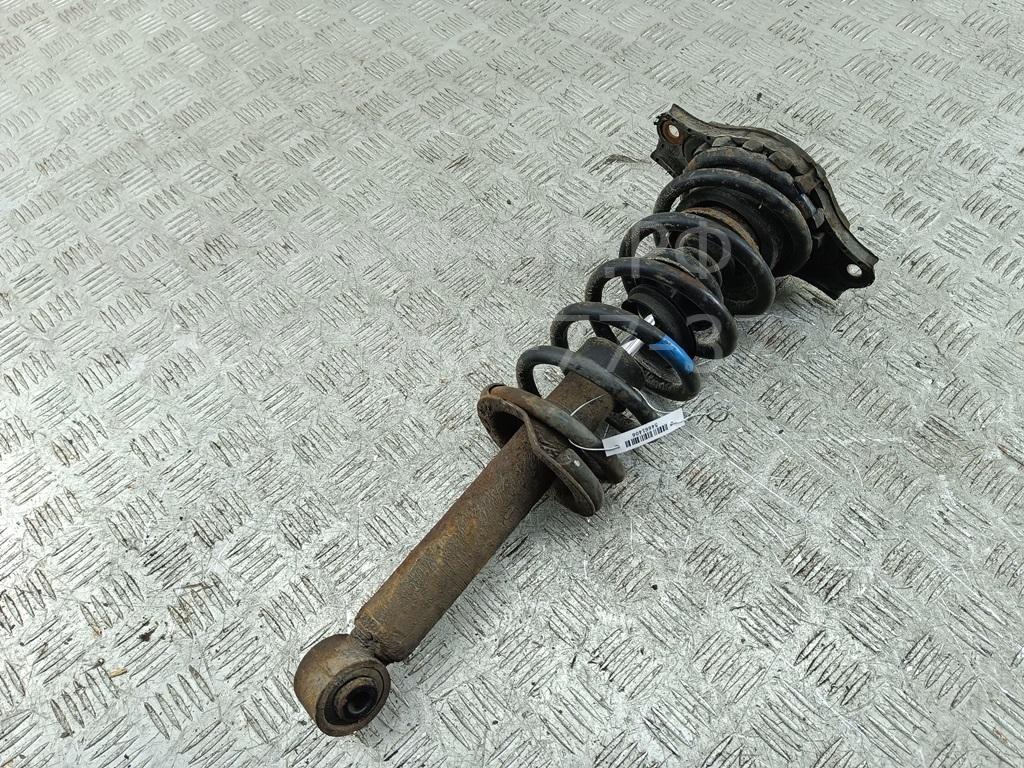 Амортизатор задний левый