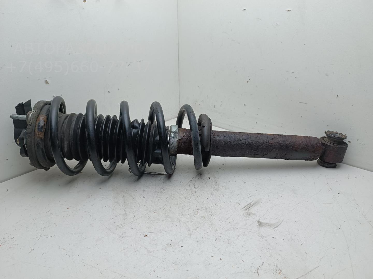 Амортизатор передний левый