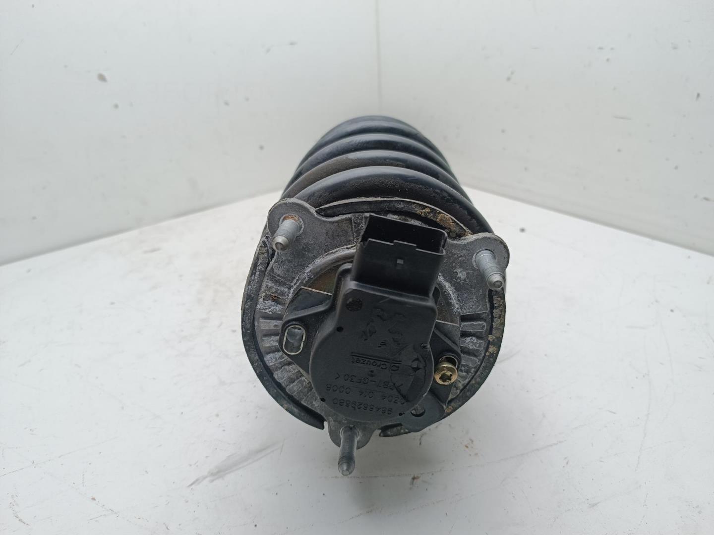 Амортизатор передний левый