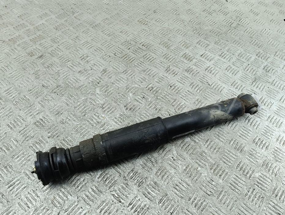 Амортизатор задний левый