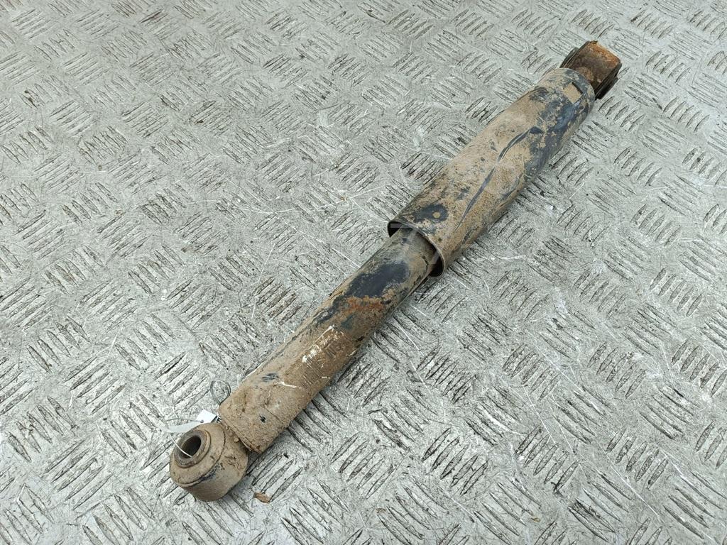 Амортизатор задний левый