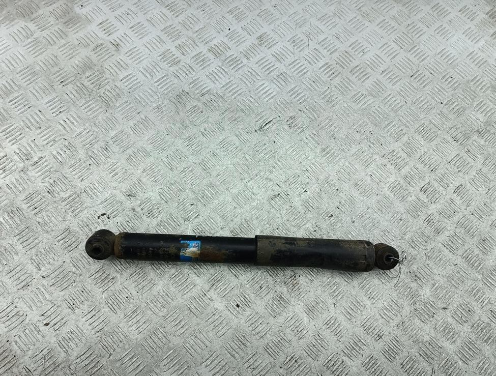 Амортизатор задний левый