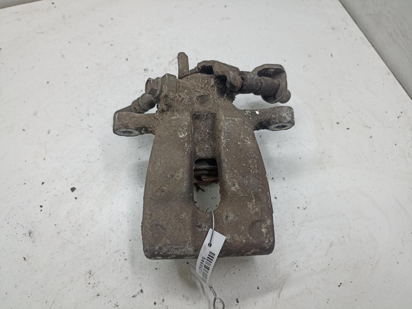 Суппорт задний левый