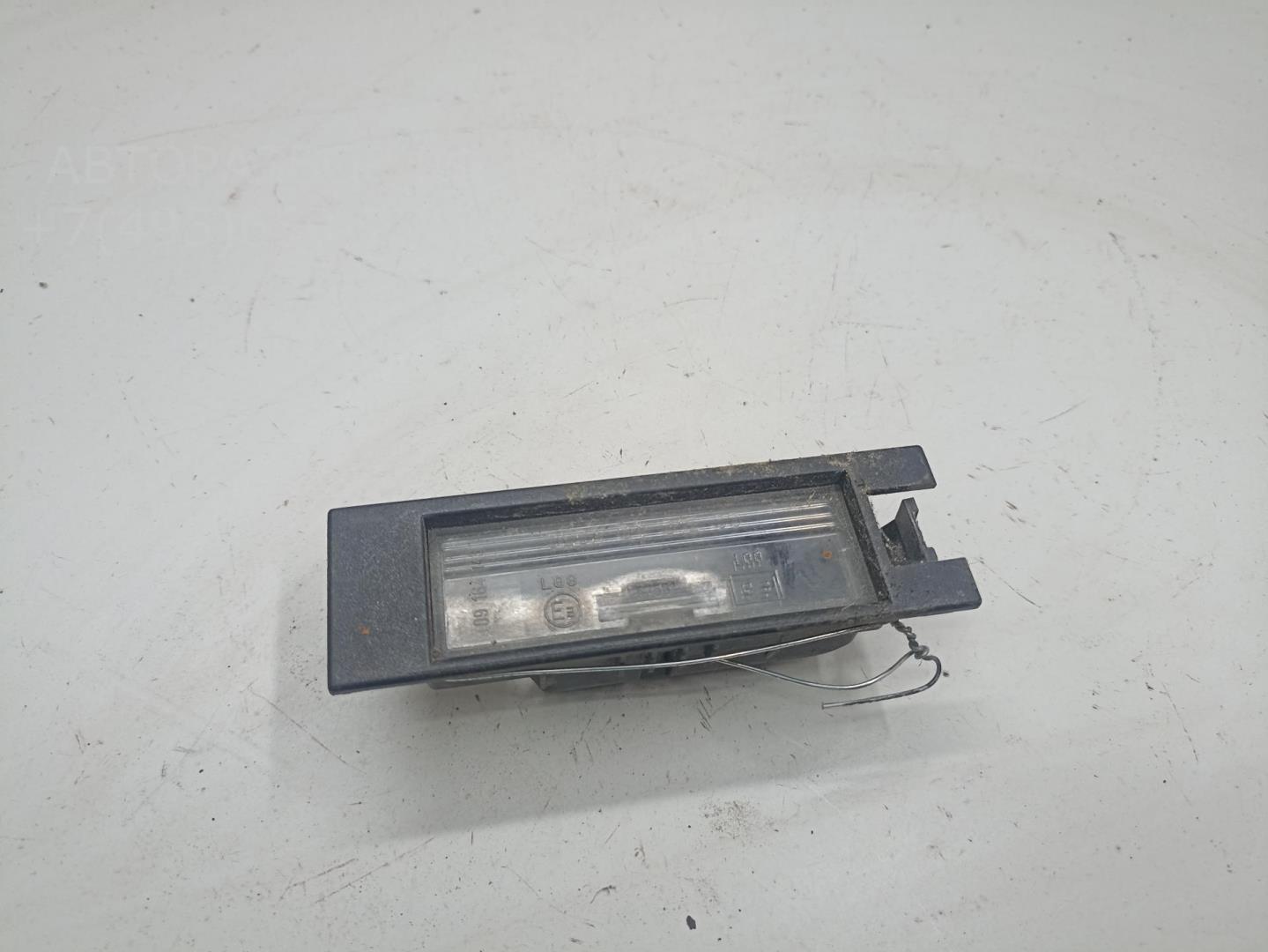 Фонарь подсветки номера