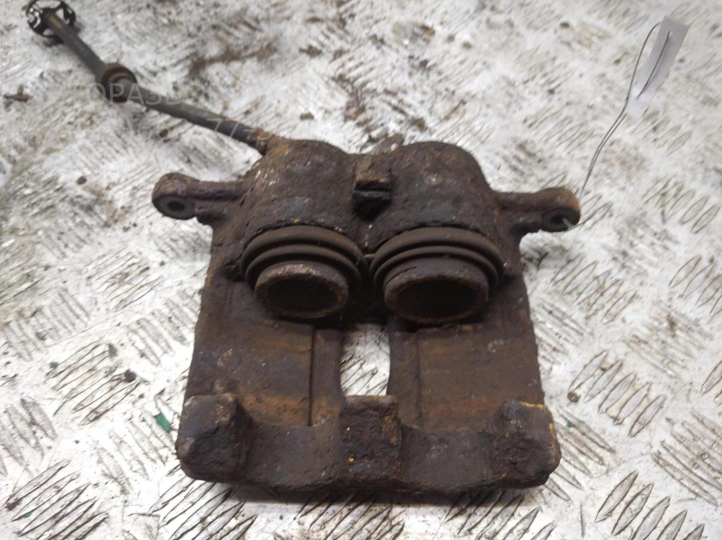 Суппорт передний левый