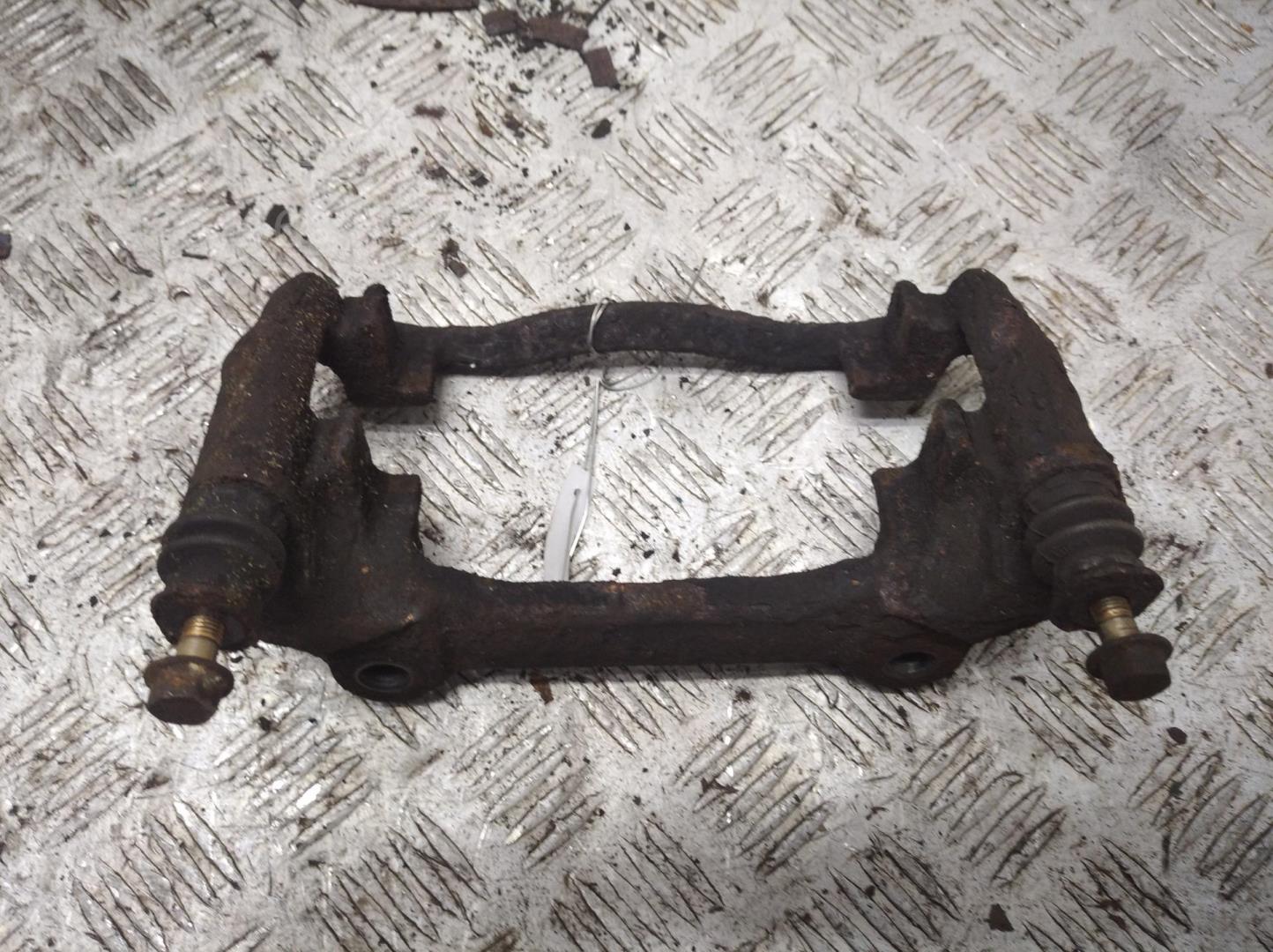 Скоба суппорта переднего