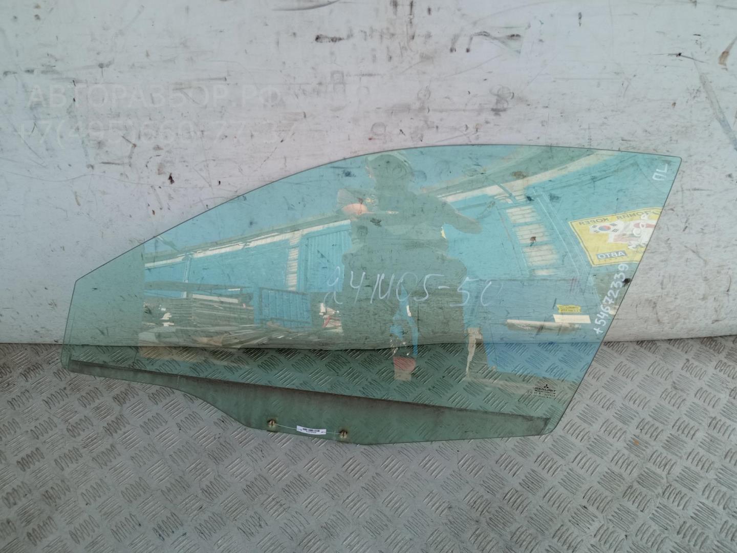Стекло двери передней левой
