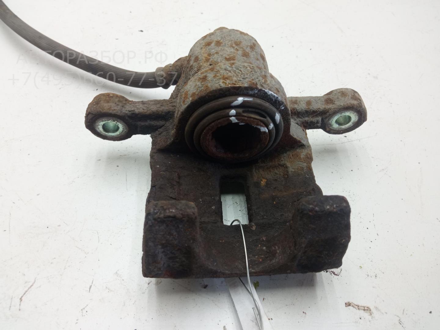 Суппорт задний левый