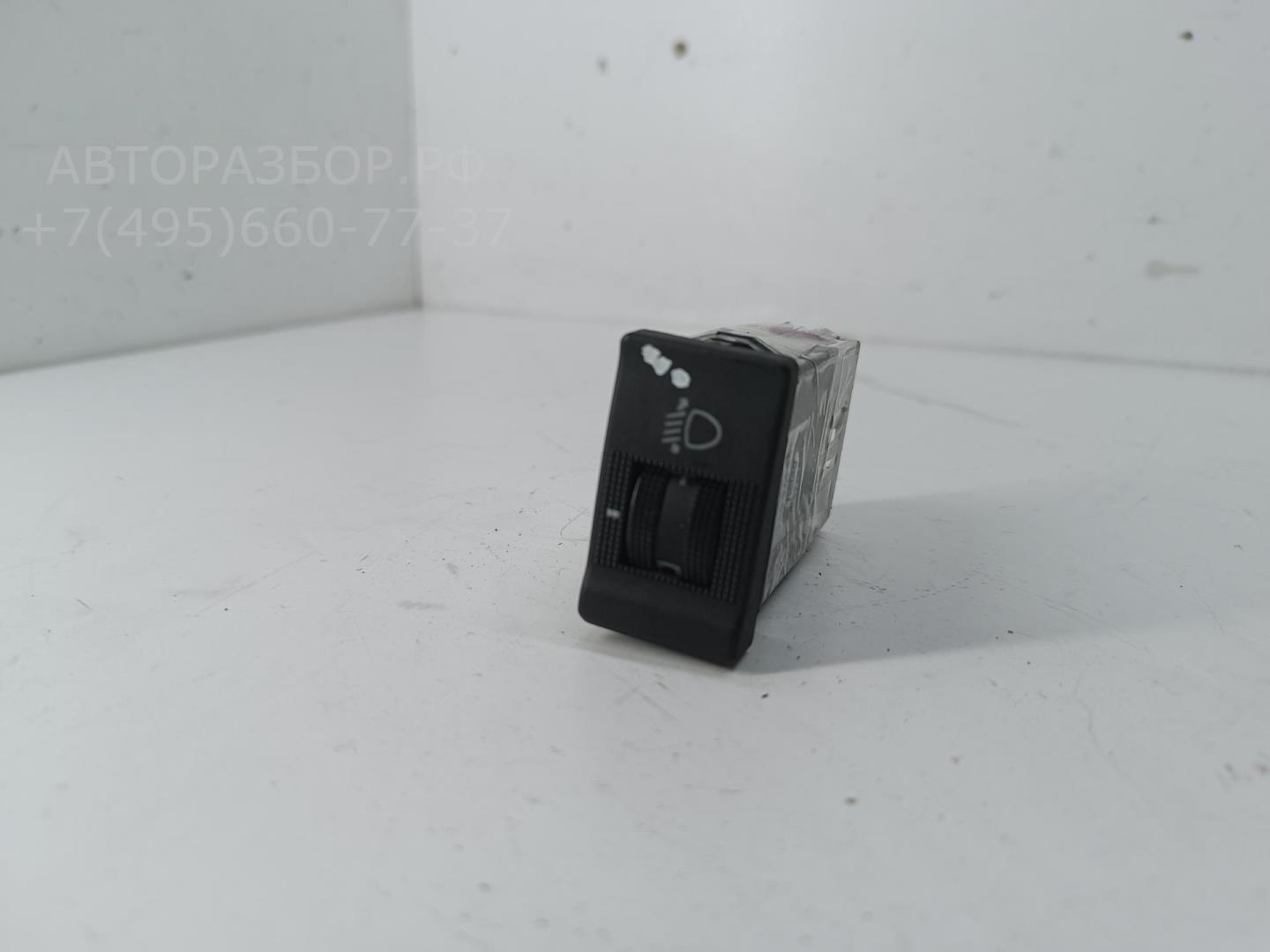 Кнопка корректора фар