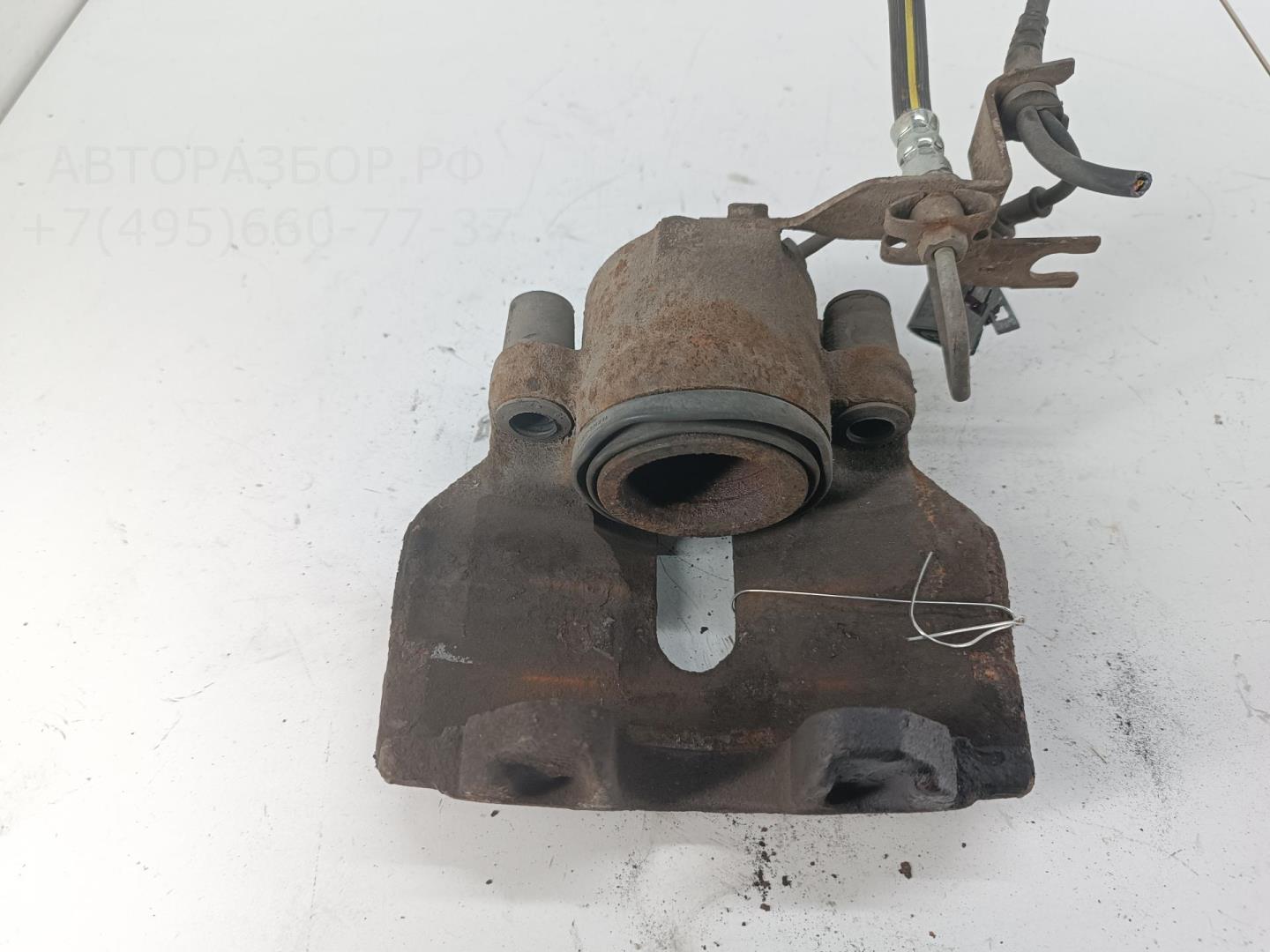 Суппорт передний левый