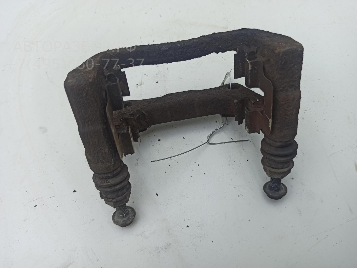 Скоба суппорта заднего