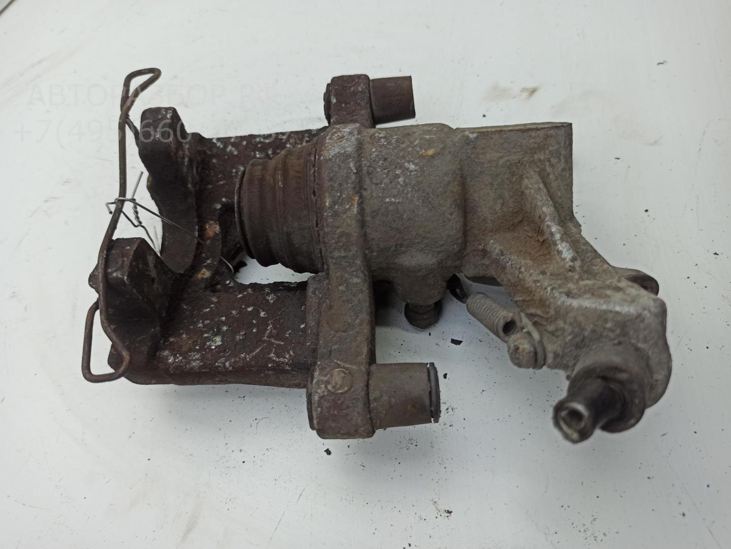 Суппорт задний левый