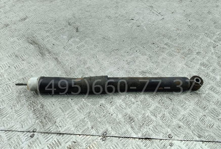 Амортизатор задний левый