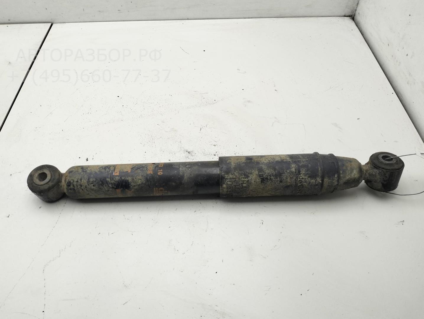 Амортизатор задний левый