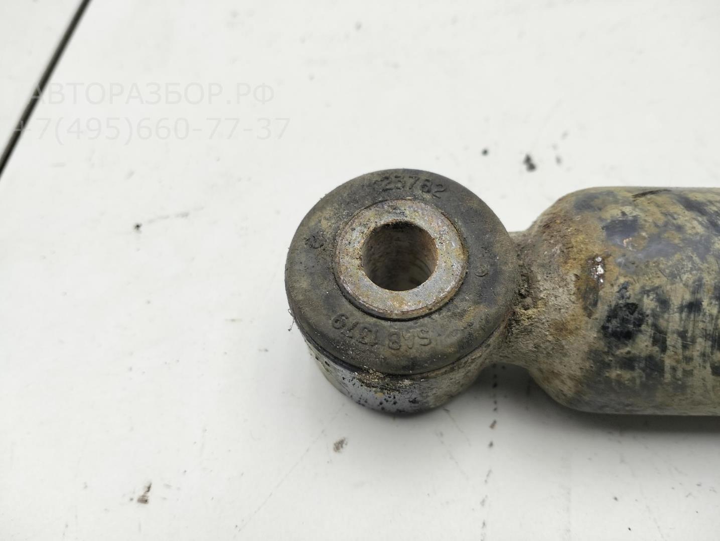 Амортизатор задний левый