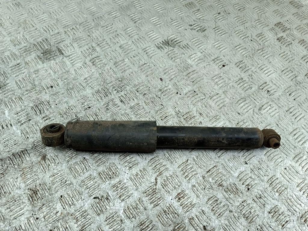 Амортизатор задний левый