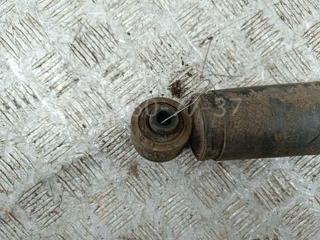 Амортизатор задний левый