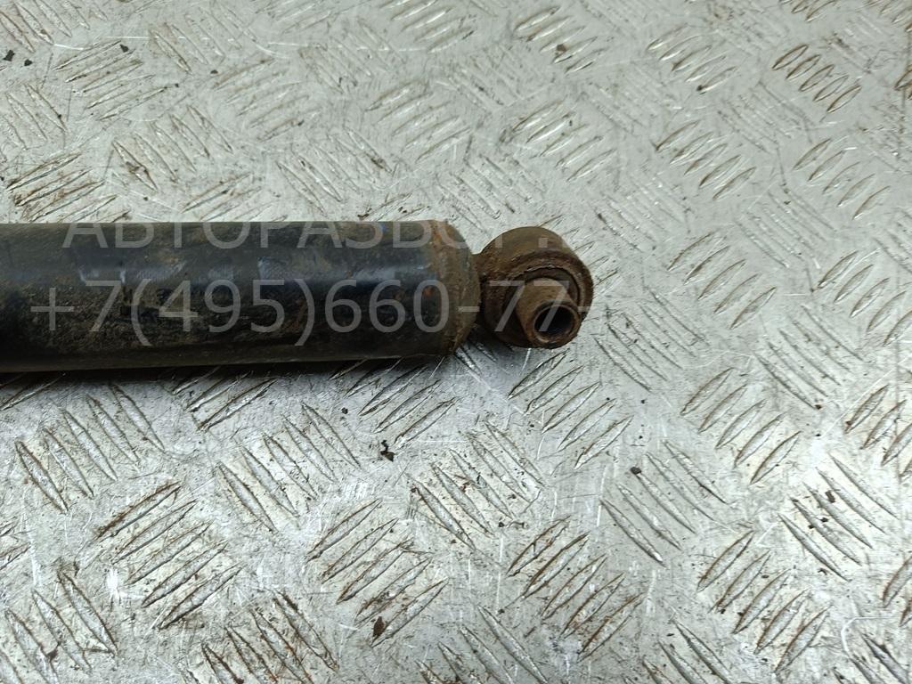 Амортизатор задний левый