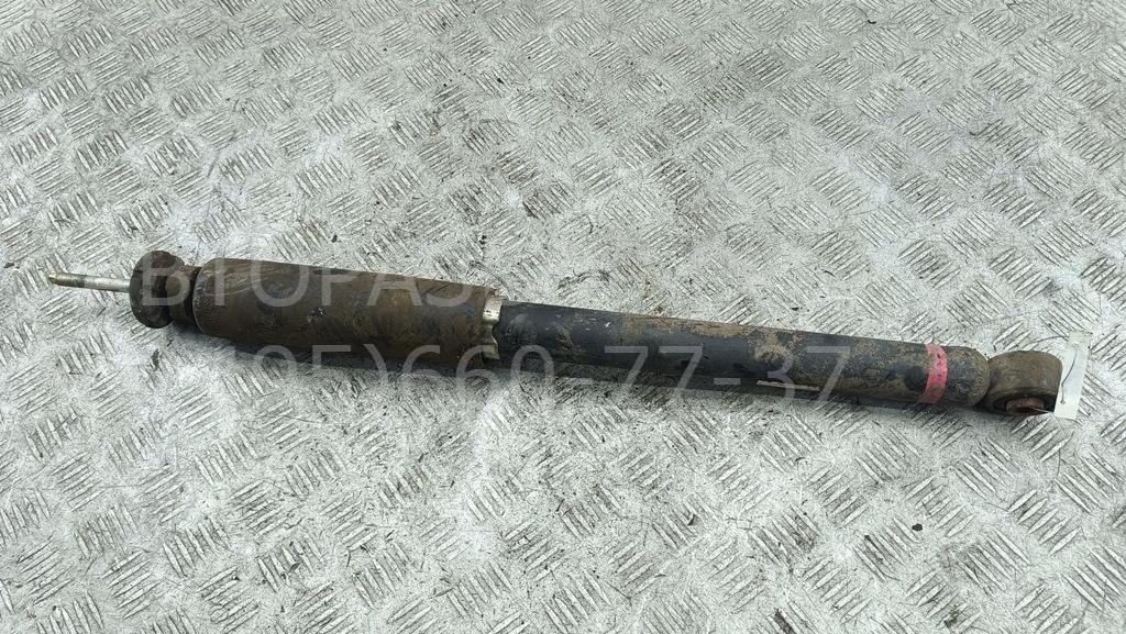 Амортизатор задний левый