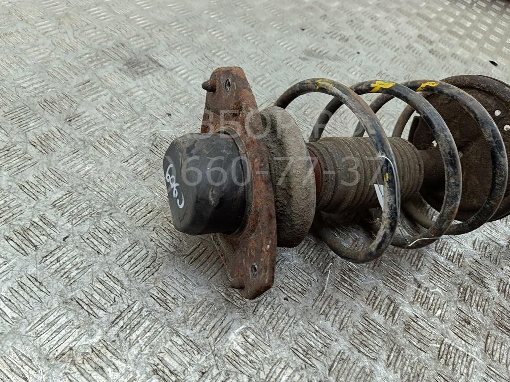 Амортизатор передний левый