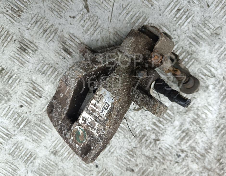 Суппорт задний левый