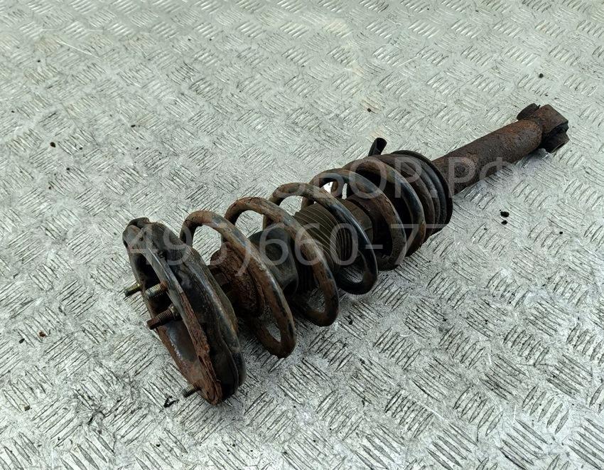 Амортизатор передний левый