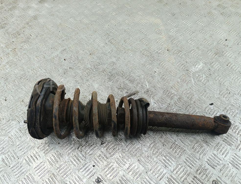 Амортизатор передний левый