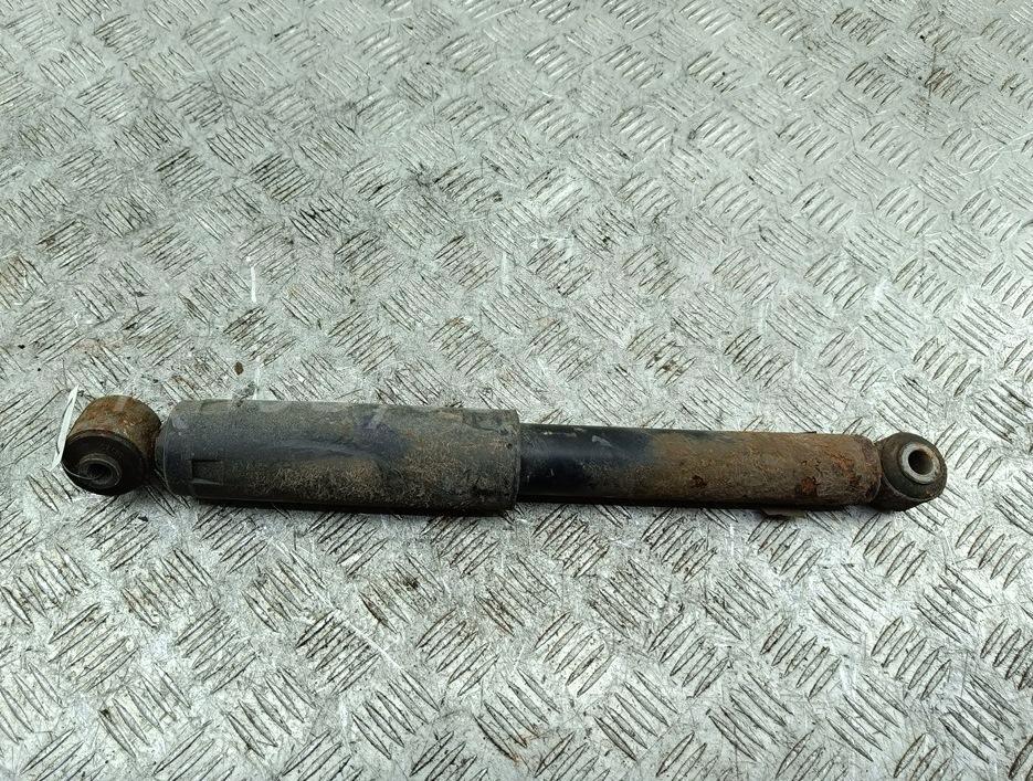 Амортизатор задний левый