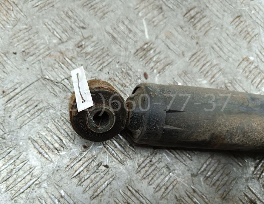 Амортизатор задний левый