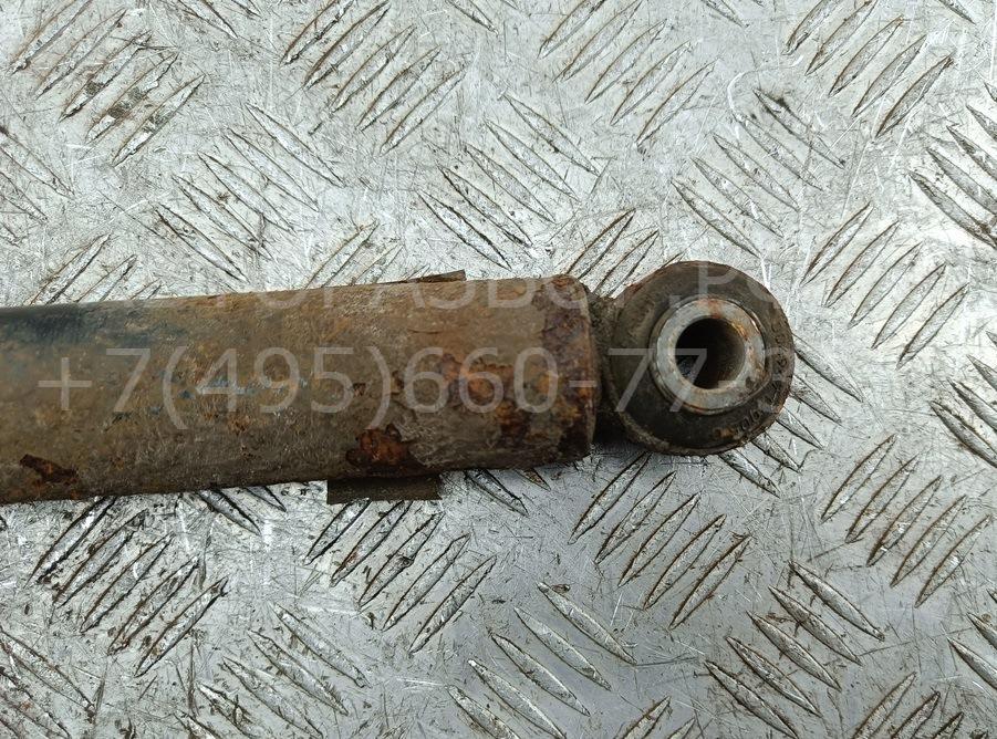 Амортизатор задний левый