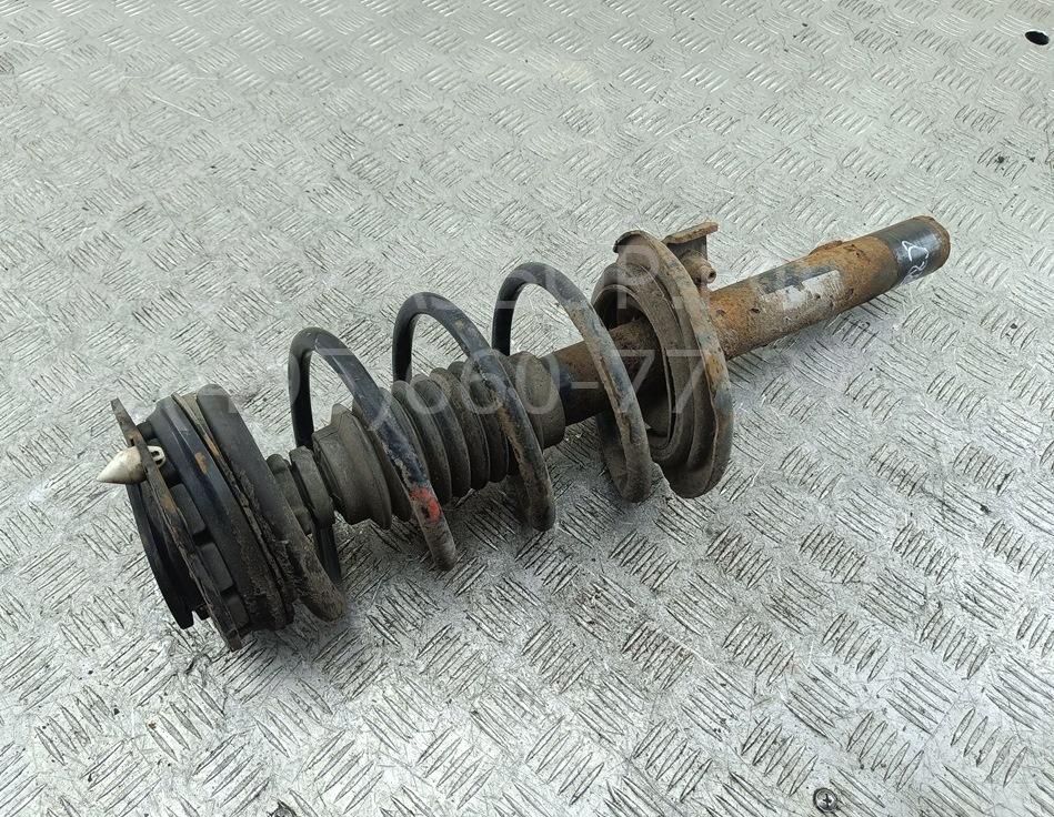 Амортизатор передний левый