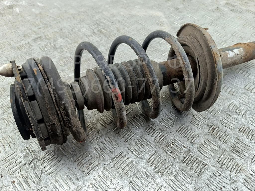 Амортизатор передний левый