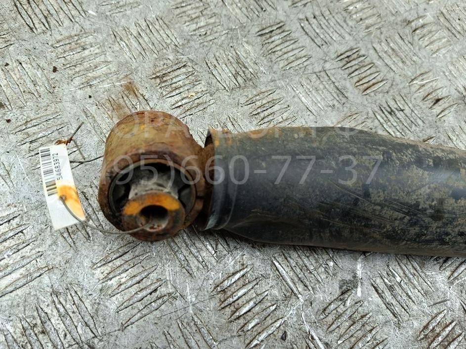 Амортизатор задний левый