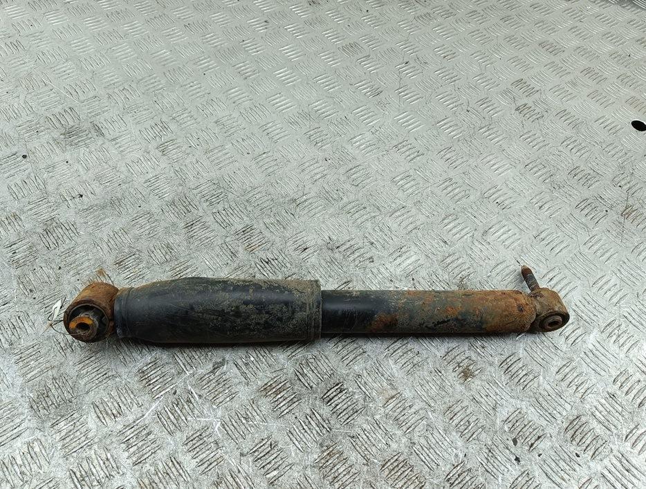 Амортизатор задний левый