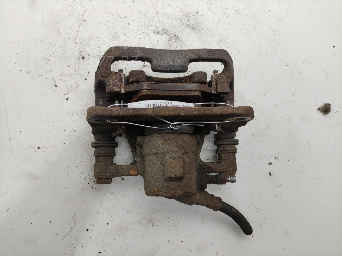 Суппорт задний левый