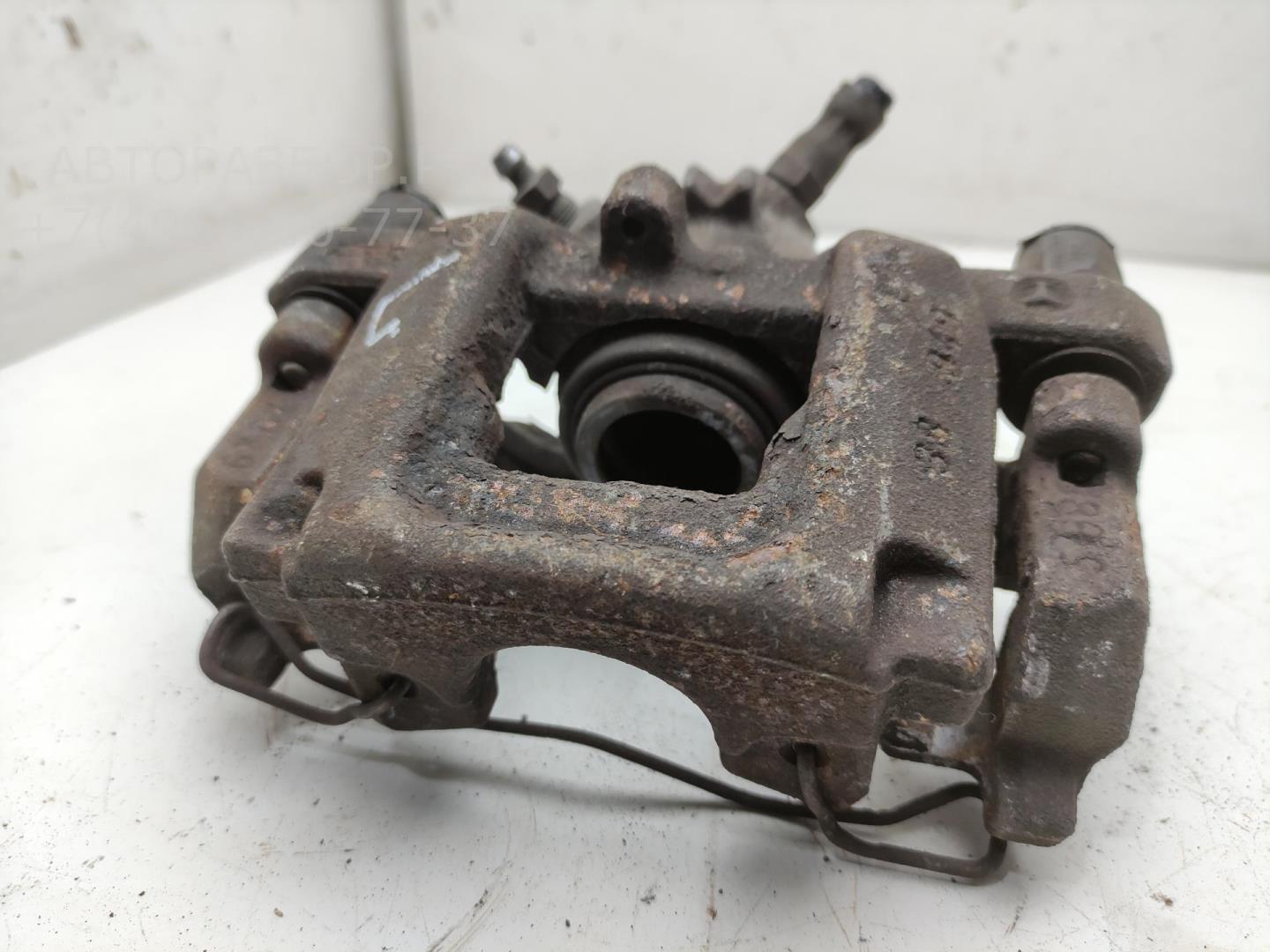 Суппорт задний левый