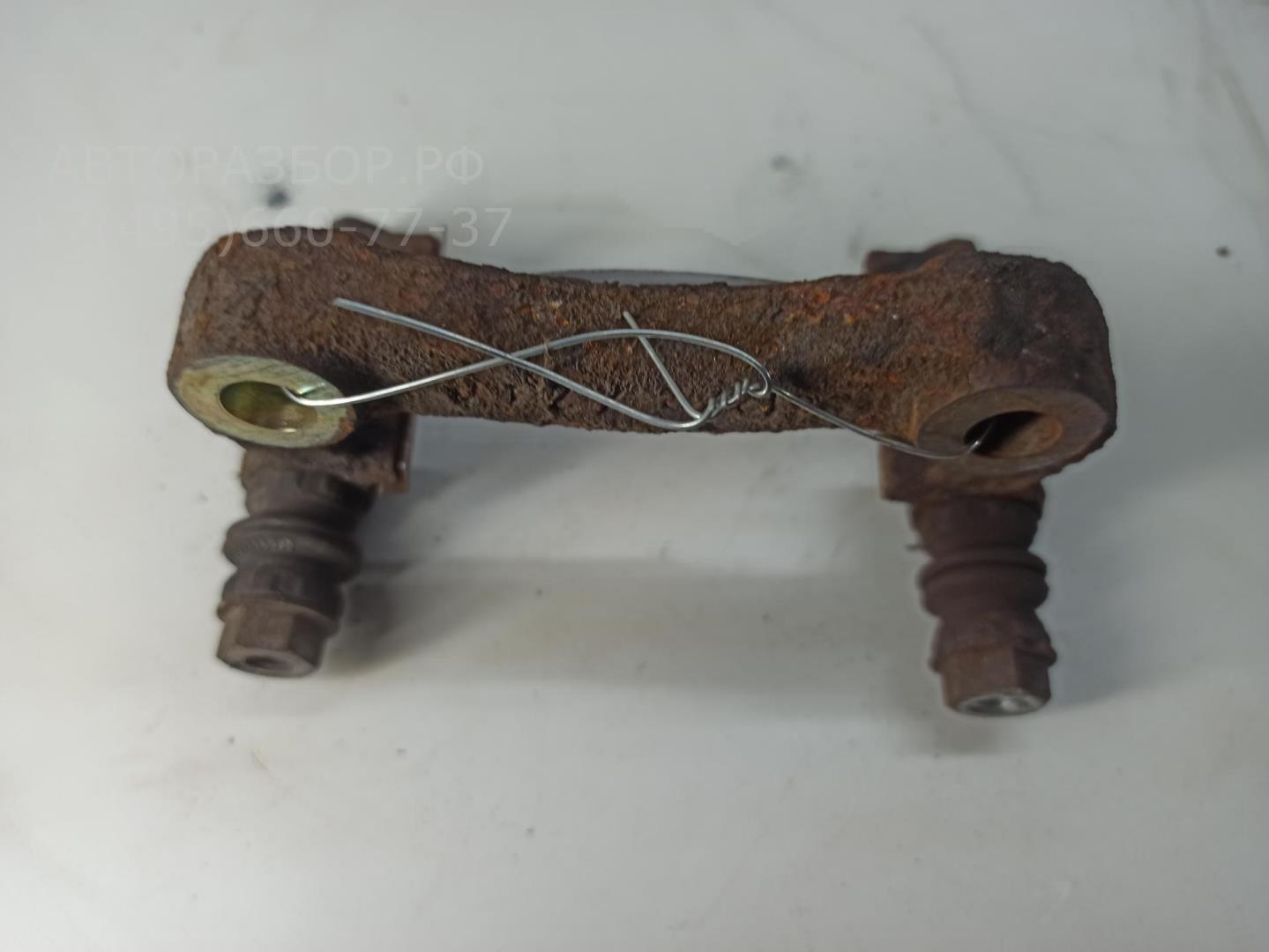 Скоба суппорта заднего