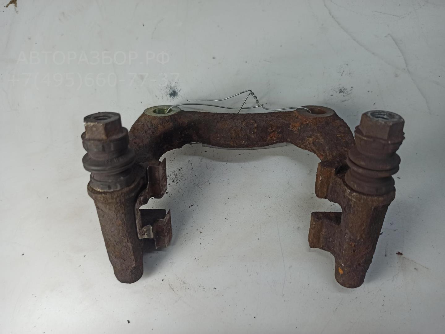 Скоба суппорта заднего