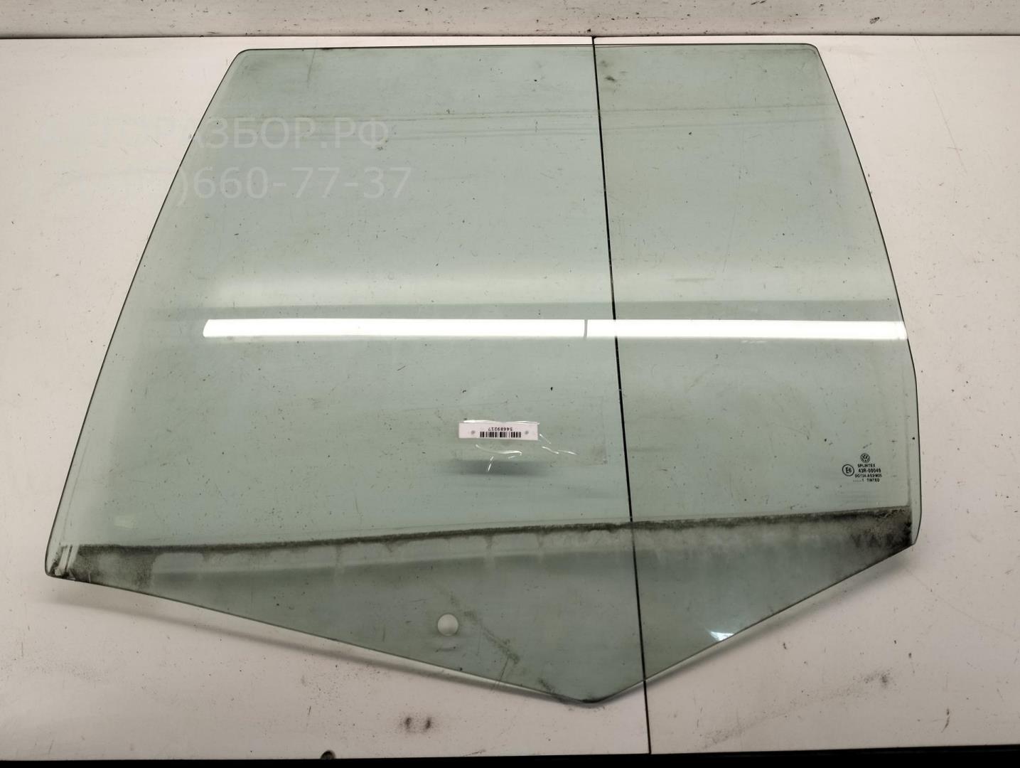 Стекло двери задней левой