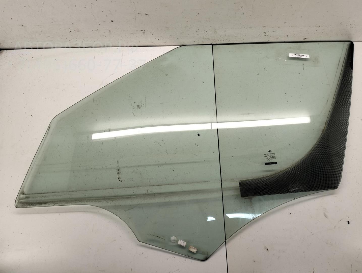 Стекло двери передней левой