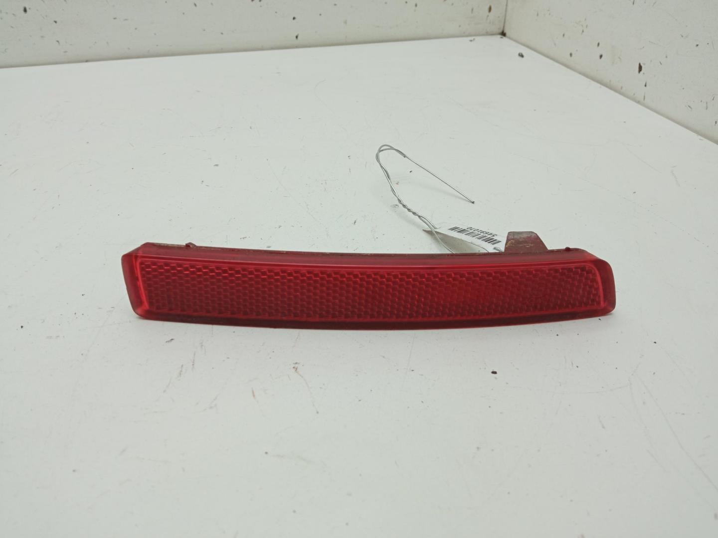 Отражатель в бампер задний левый