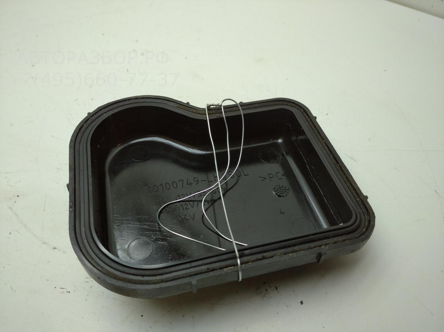 Крышка фары левой