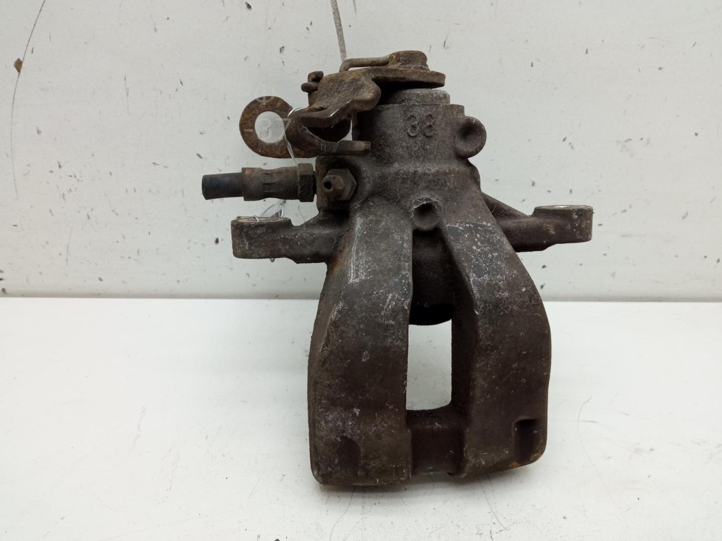 Суппорт задний левый