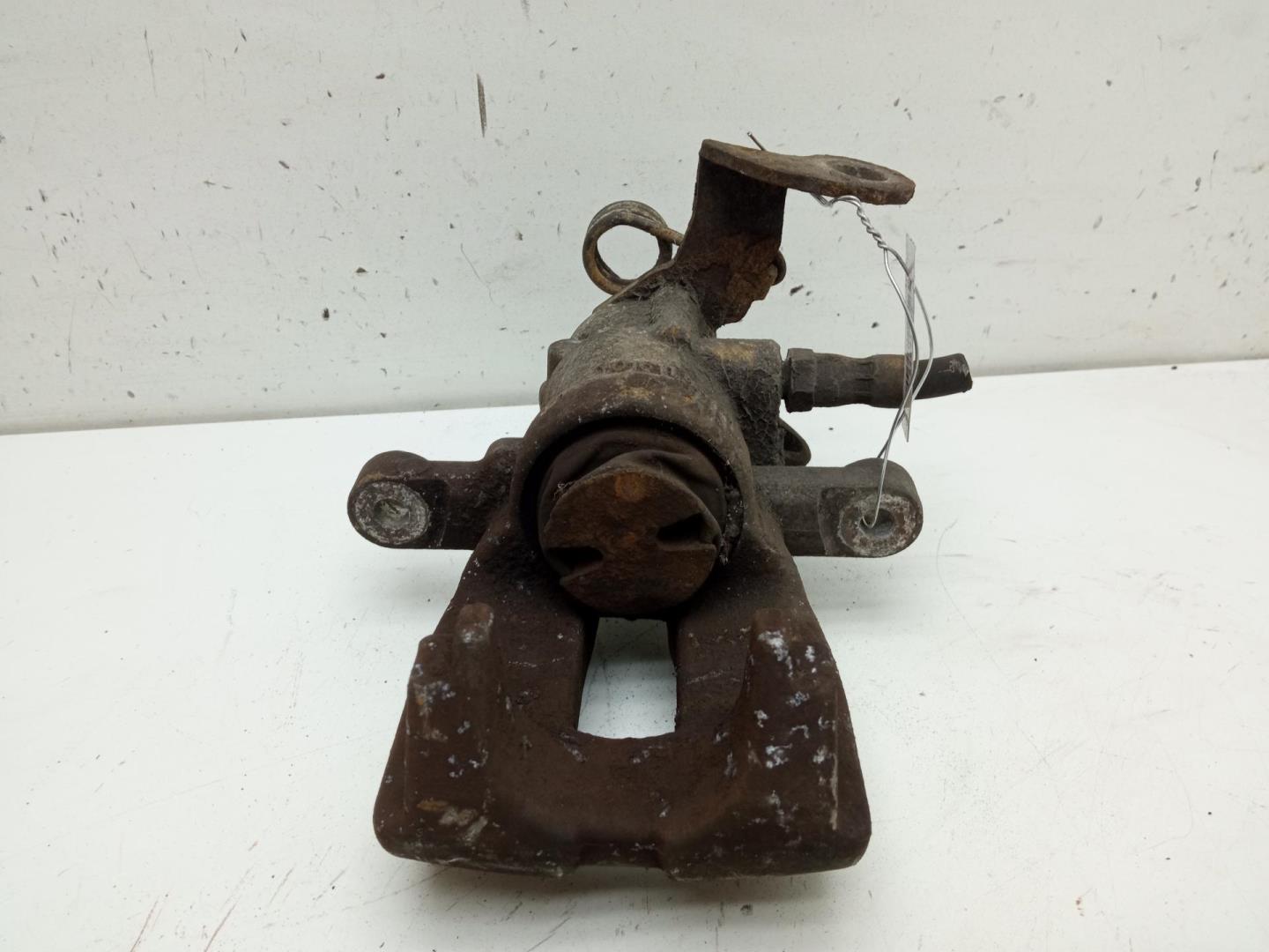 Суппорт задний левый