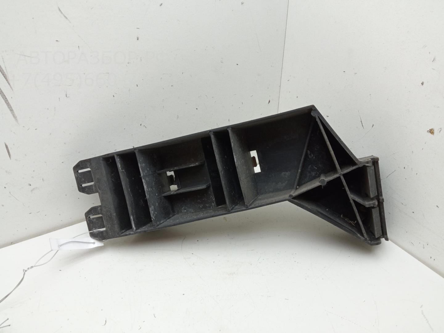 Кронштейн переднего бампера левый