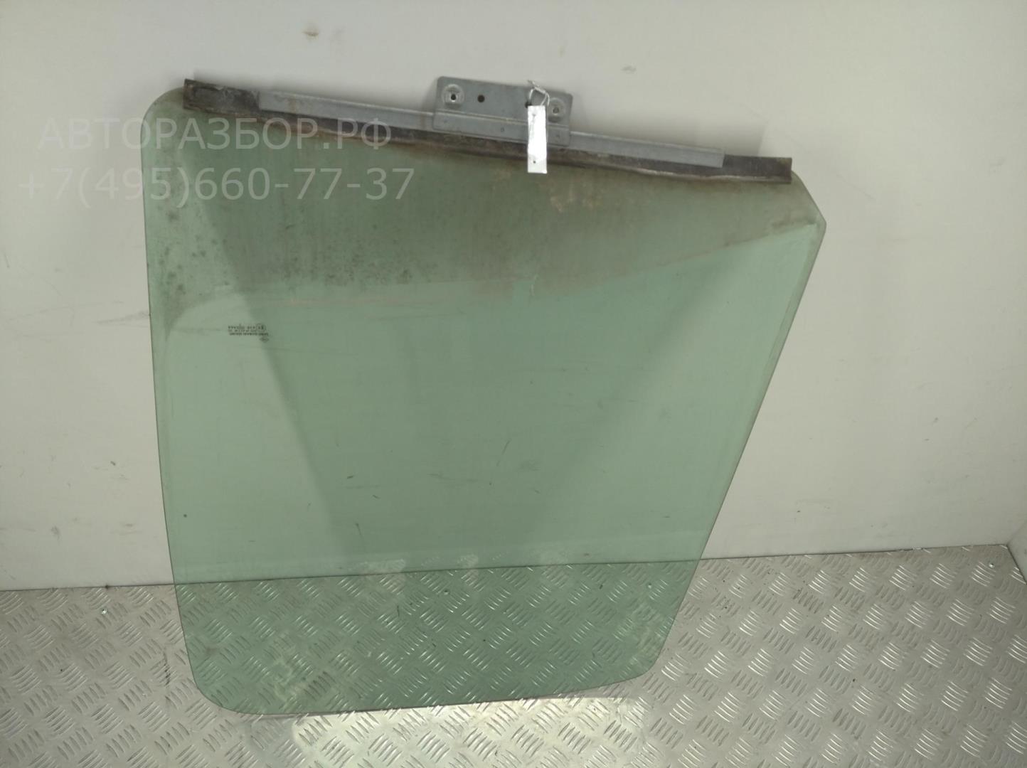 Стекло двери передней левой