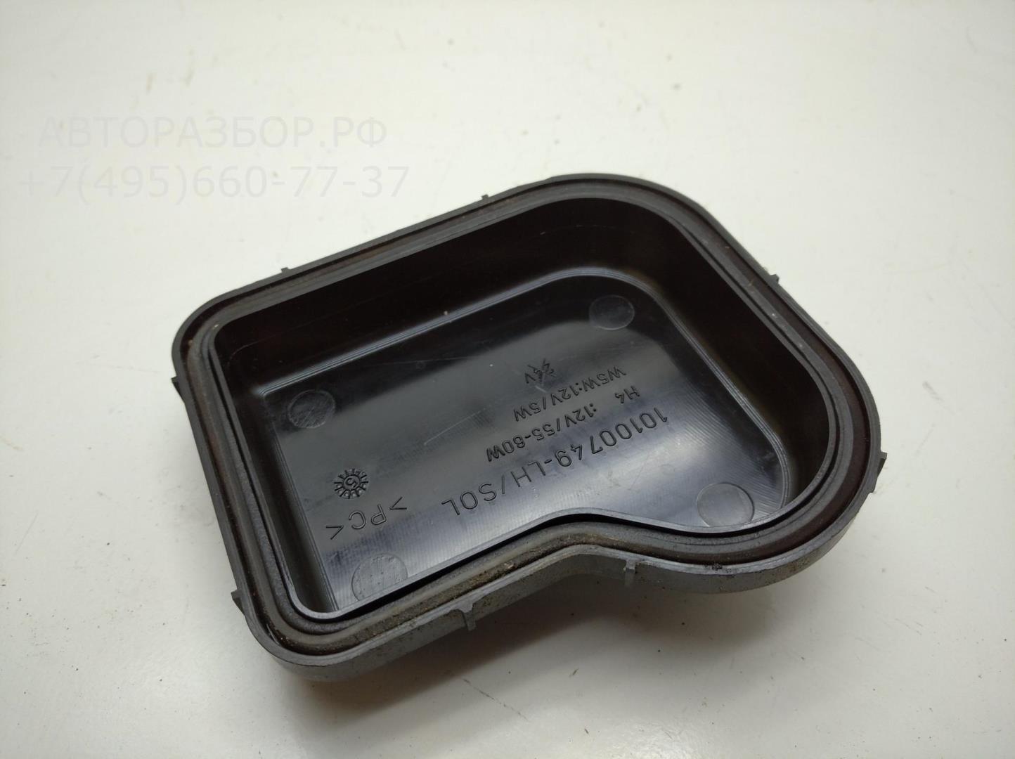 Крышка фары левой