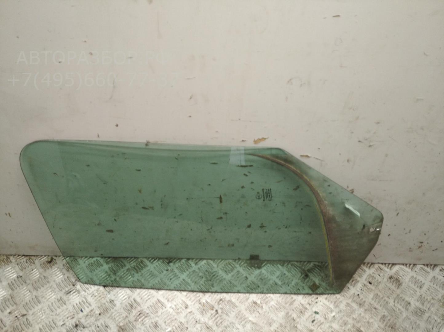 Стекло двери передней левой